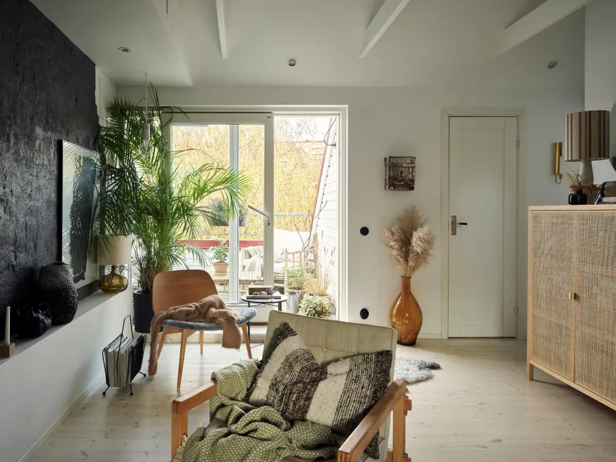 Gray Tones and High Ceilings in a Cozy Swedish Duplex Apartment 6 living room glass balcony doors