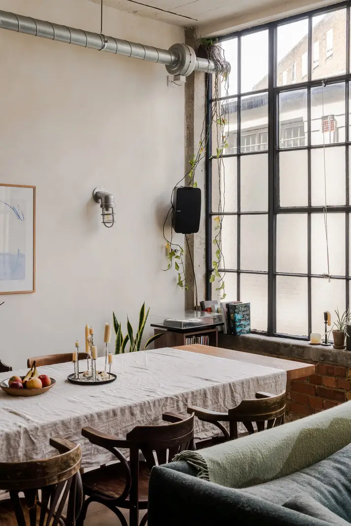 An Industrial London Apartment in a Former 1920s Shoe Factory 5 living room industrial factory windows