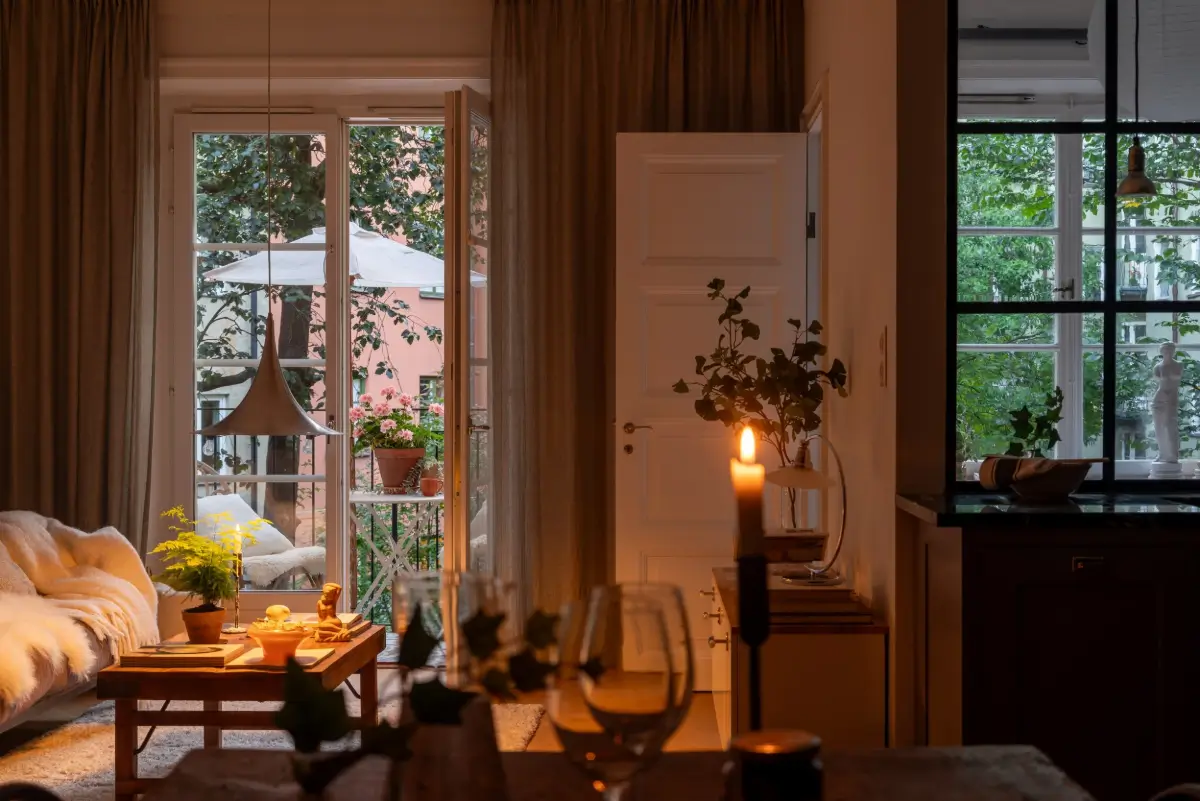 A Gray Kitchen with a Green Marble Countertop in a Small Apartment 11 living space at night
