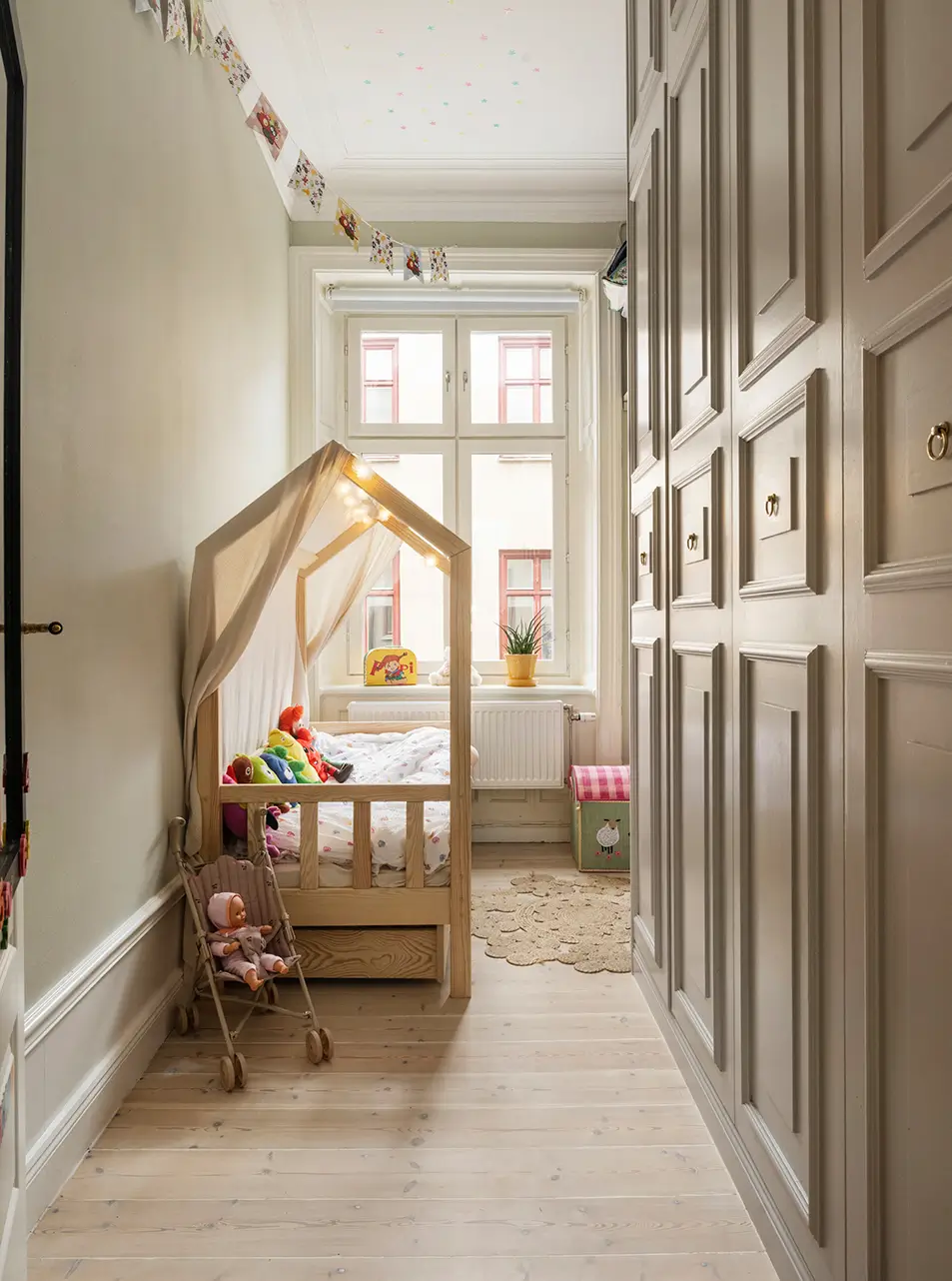 A Stylish Beige Apartment with a Light Blue Kitchen 27 narrow kids bedroom floor-to-ceiling wardrobes
