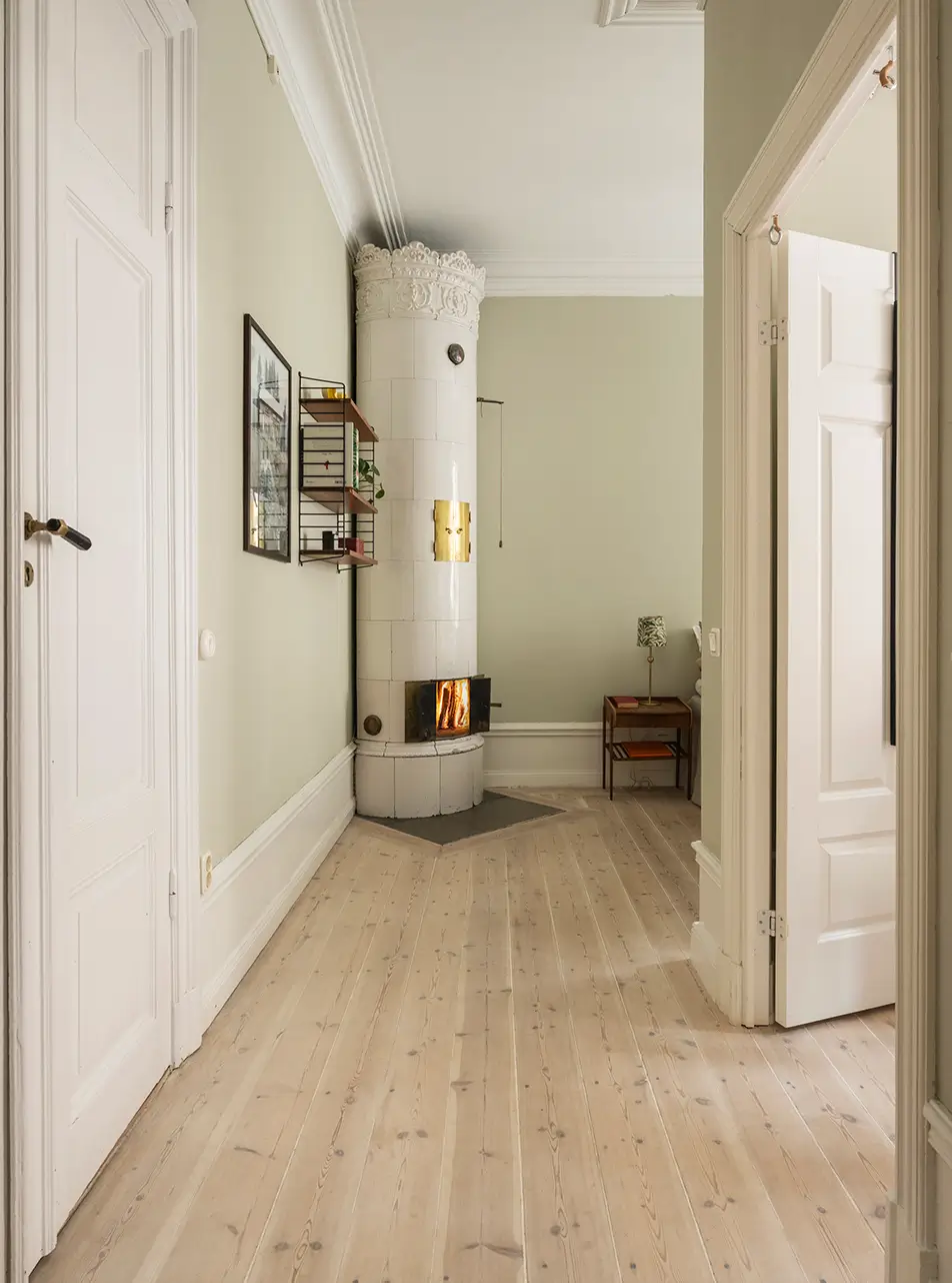A Stylish Beige Apartment with a Light Blue Kitchen 21 open hall to bedroom