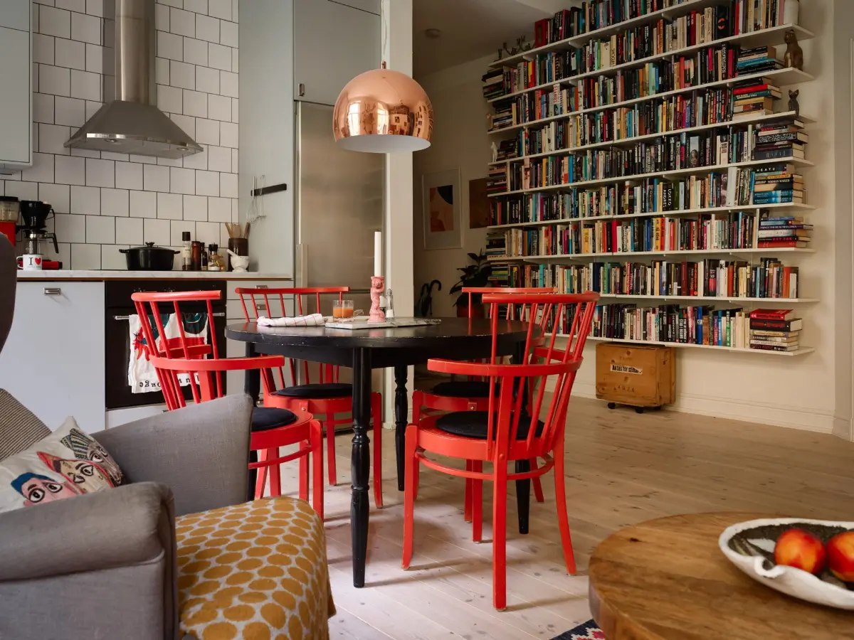 A Well-Planned Family Apartment with Historic Character 14 open-plan living room with bookshelves