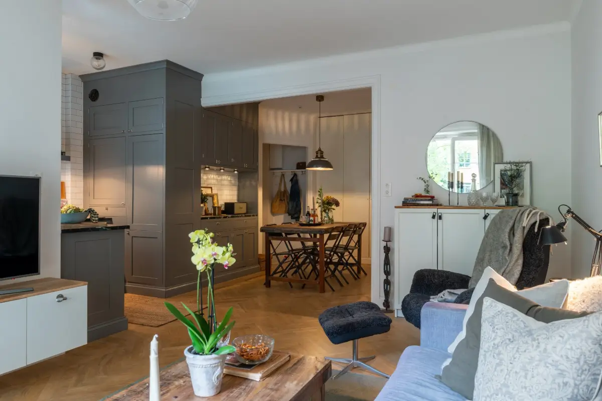 A Gray Kitchen with a Green Marble Countertop in a Small Apartment 12 open-plan living space gray kitchen