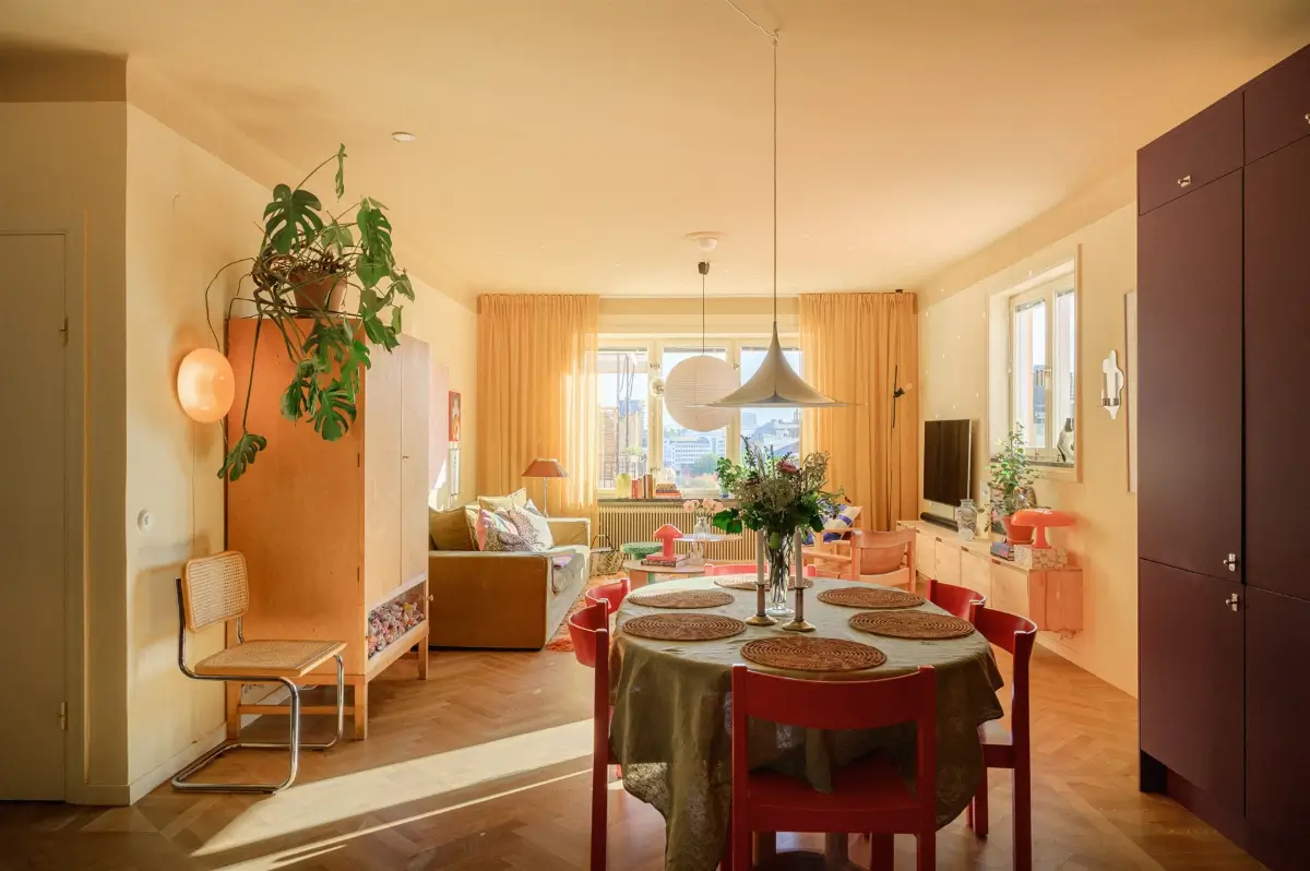 A Colorful Stockholm Family Apartment with Views of the Lake 7 open-plan living space light yellow walls nordroom