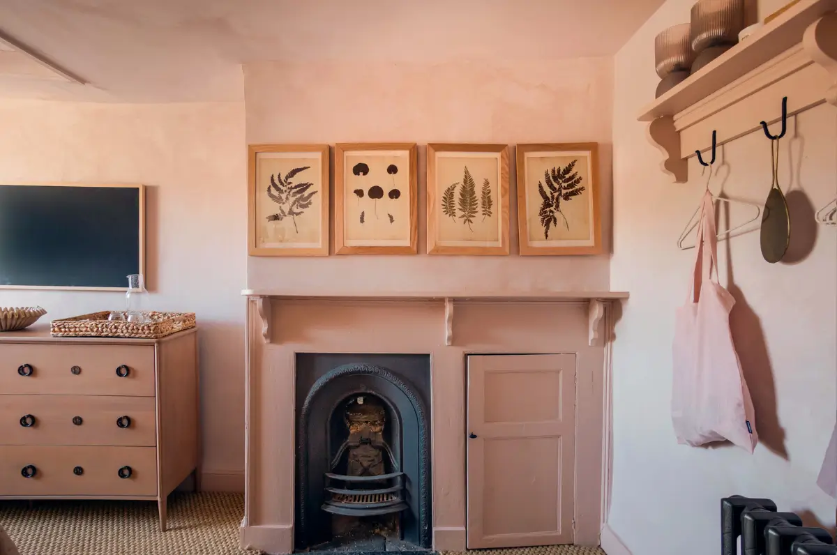 Lime Paint and Cozy Rooms in a Charming English Cottage 19 plaster pink bedroom fireplace