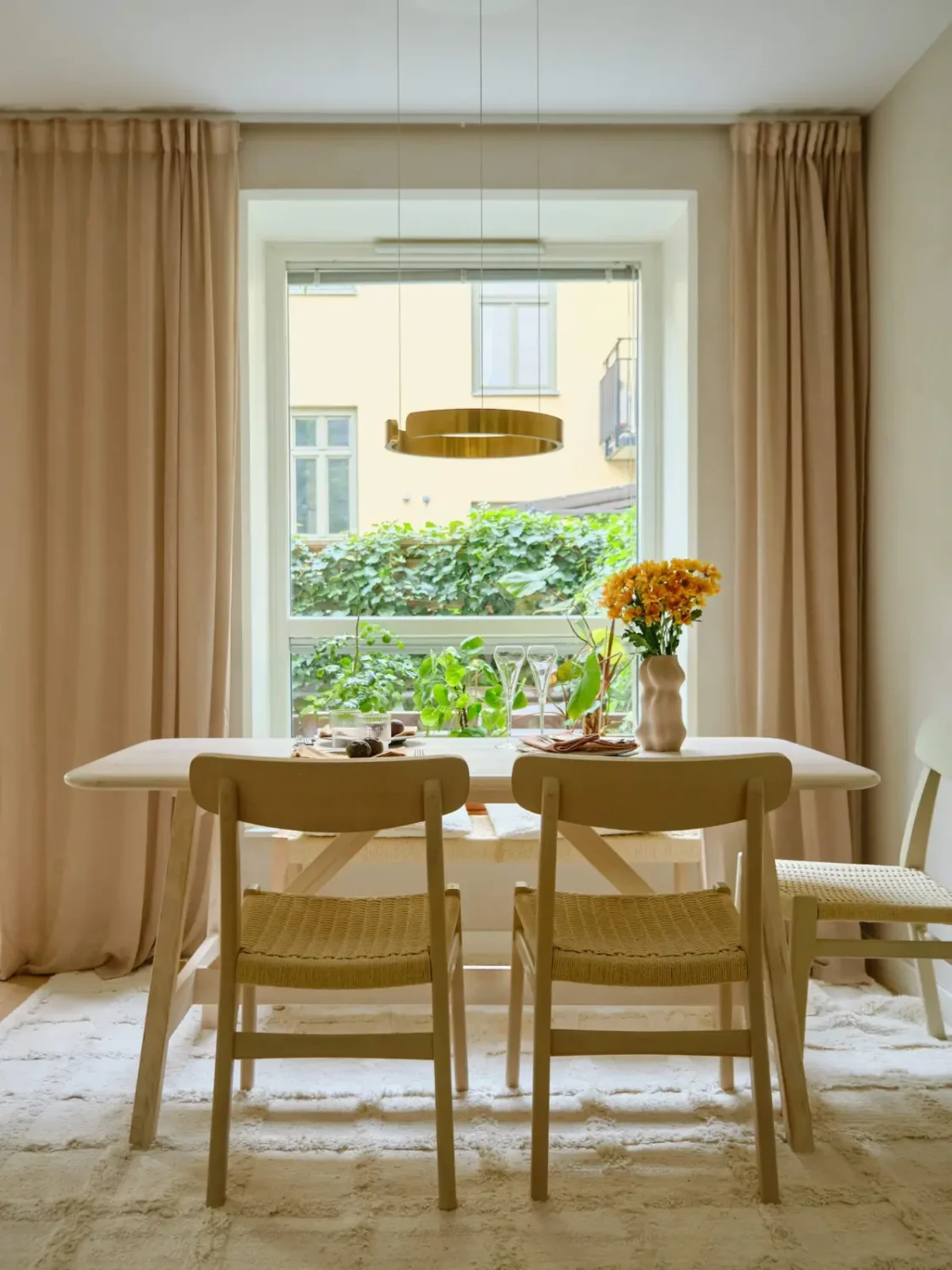 Former Stables Transformed into a Modern, Light House with Plaster Walls 2 scandi dining table