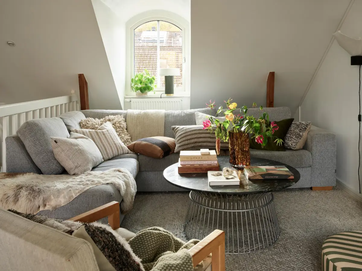 Gray Tones and High Ceilings in a Cozy Swedish Duplex Apartment 4 scandi sitting room