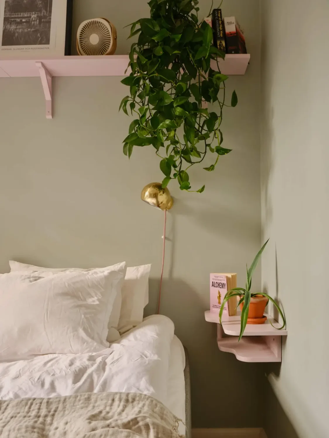 Green and Apricot Rooms in a Charming Stockholm Apartment 22 small bedroom gray-green walls light pink shelves