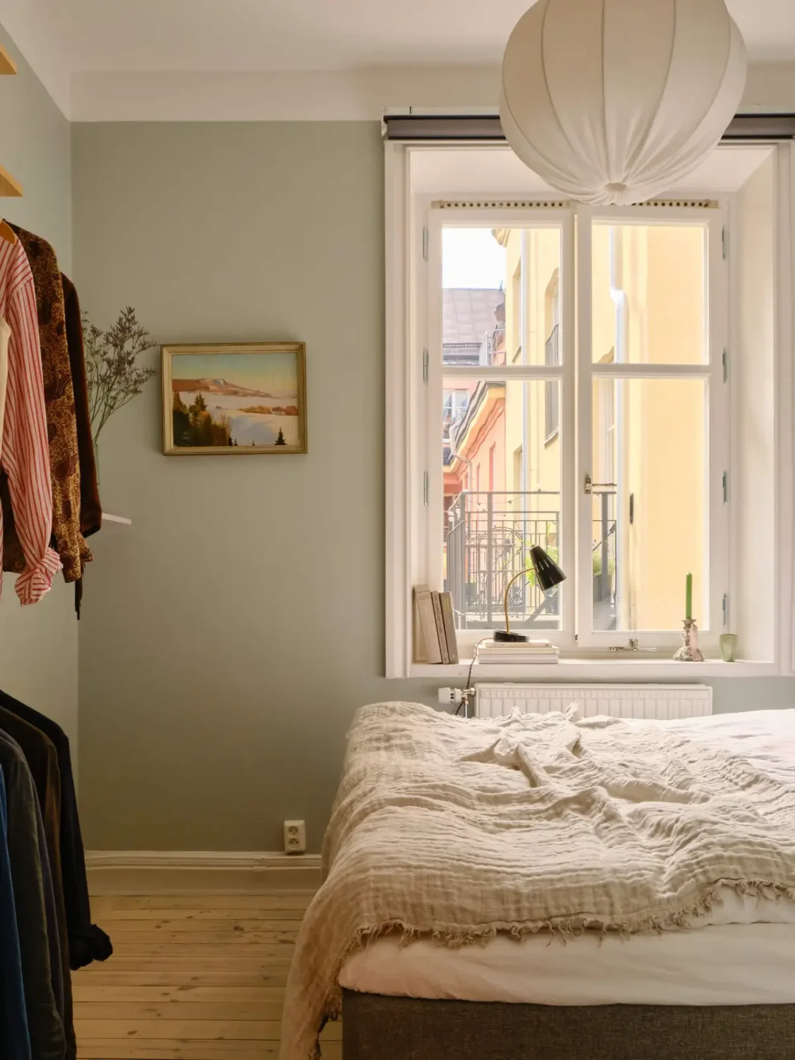 Green and Apricot Rooms in a Charming Stockholm Apartment 20 small bedroom gray-green walls wooden floor