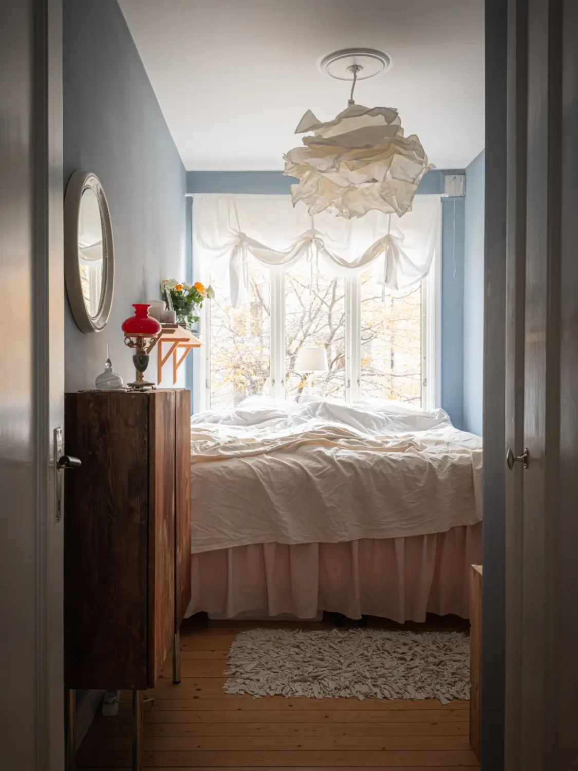 The Color Trends for 2026: A Return to Nature, Balance, and Grounding 38 small-blue-bedroom-dark-stained-cabinets-color-trends-2026-nordroom