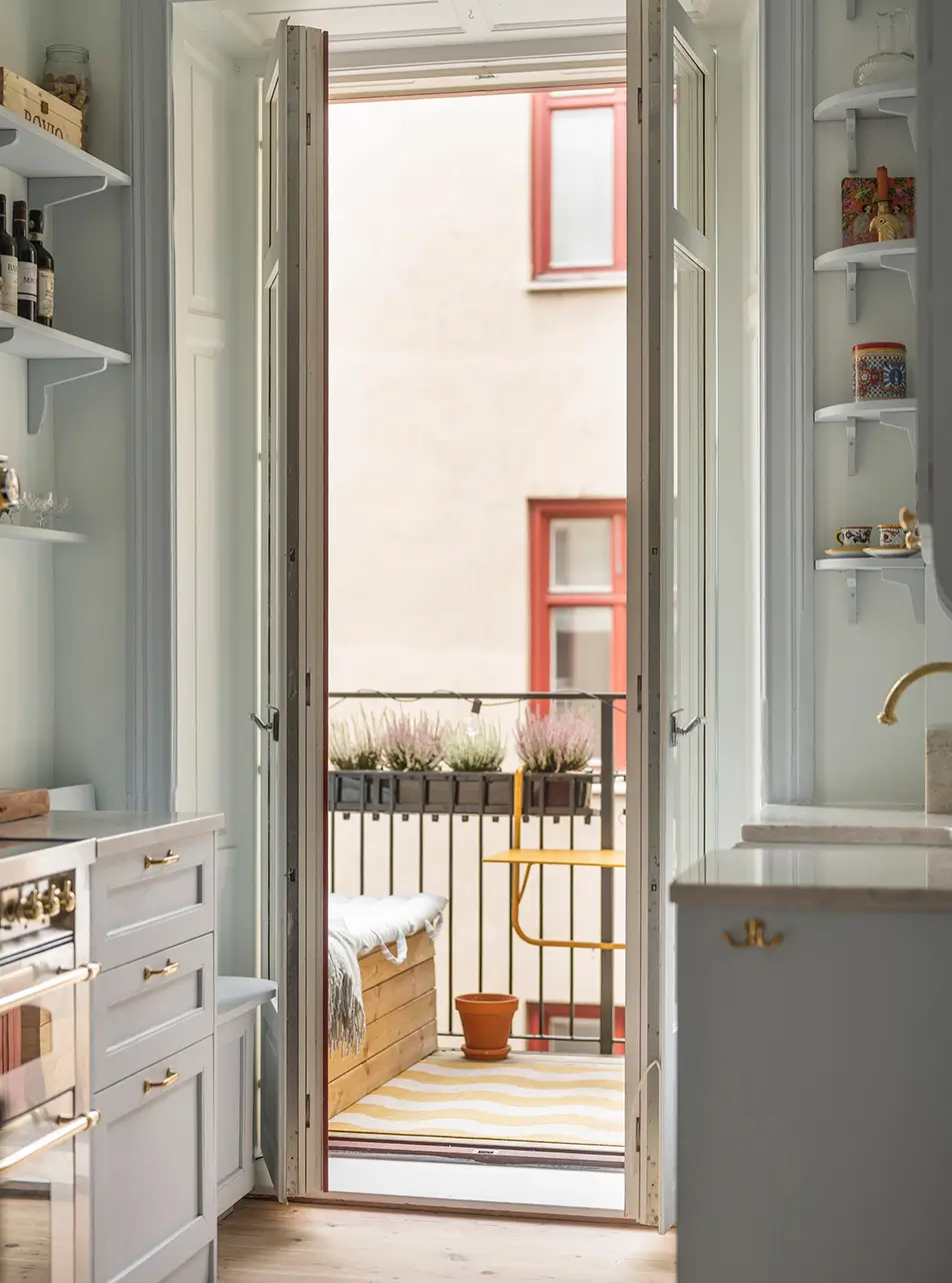 A Stylish Beige Apartment with a Light Blue Kitchen 16 small light blue kitchen brass fittings