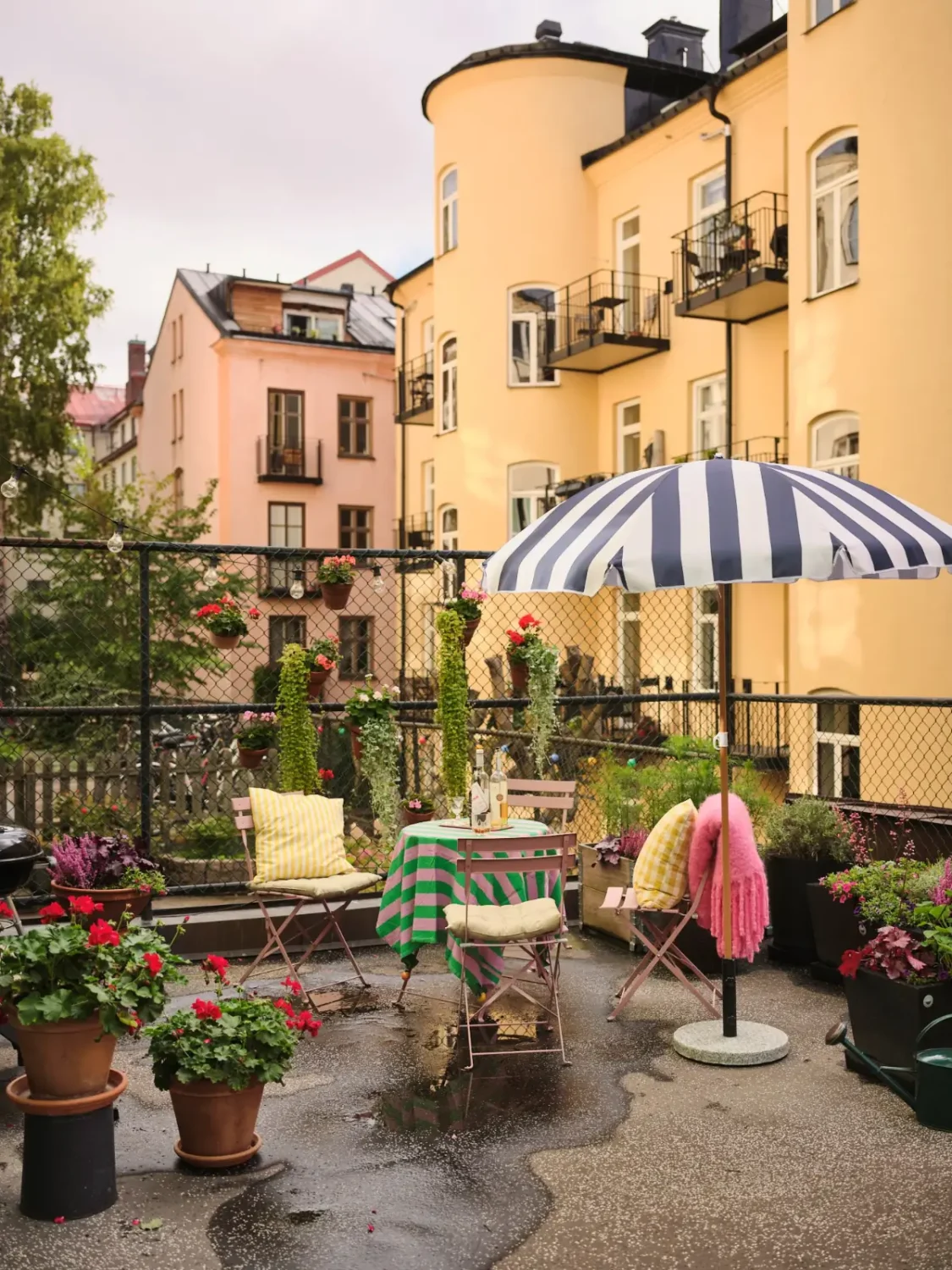Color, Books, and a Walk-In Wardrobe in a Small Stockholm Apartment 6 terrace