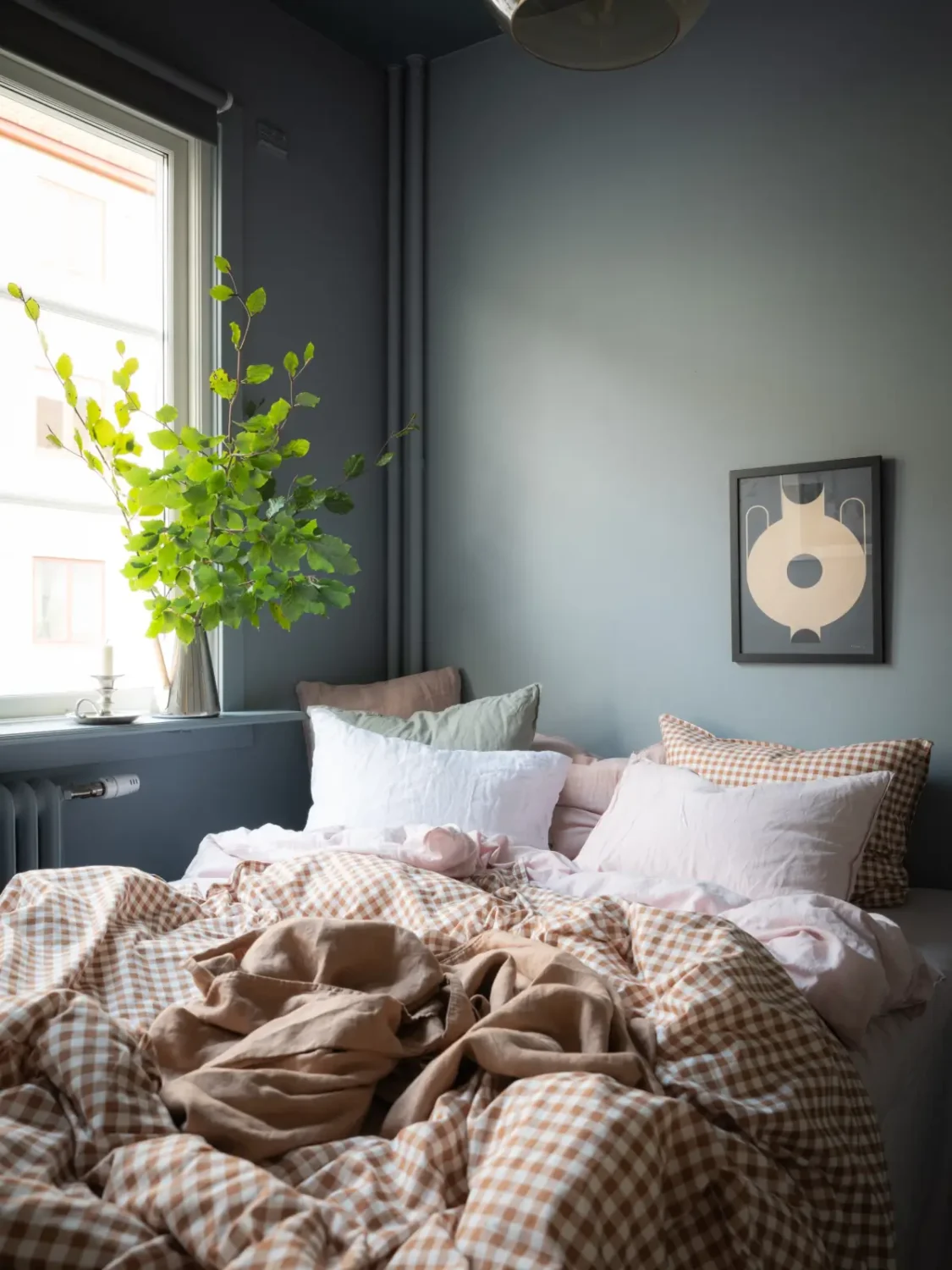 The Color Trends for 2026: A Return to Nature, Balance, and Grounding 33 tiny-blue-green-bedroom-checkered-ochre-bedding-color-trends-2026-nordroom