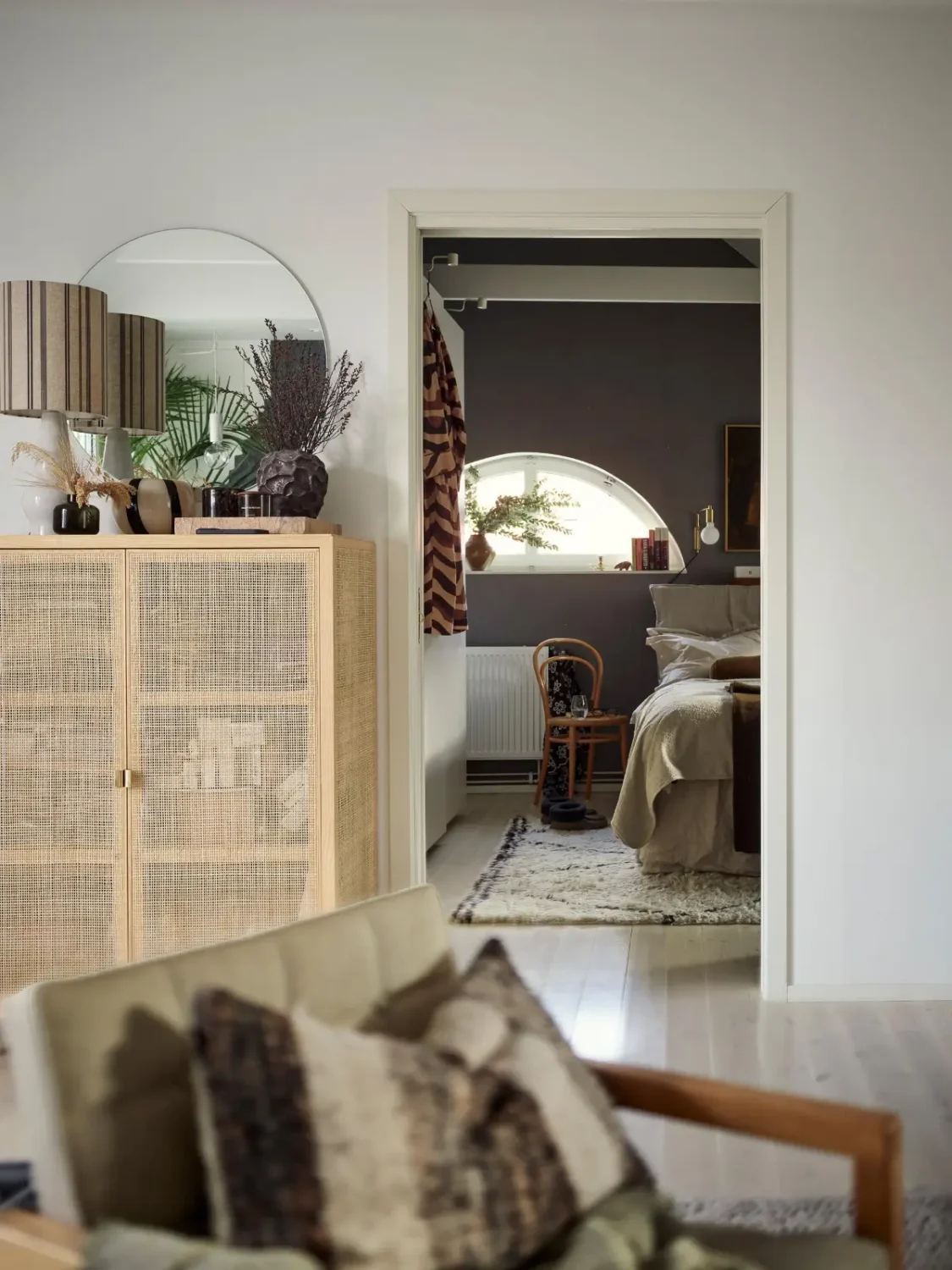 Gray Tones and High Ceilings in a Cozy Swedish Duplex Apartment 11 view into bedroom