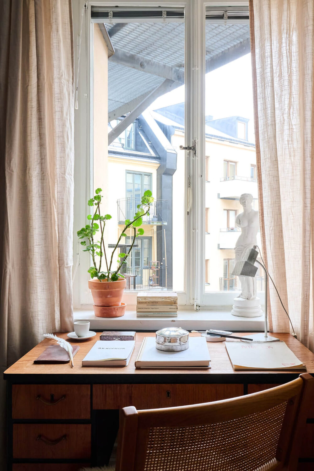 A Bright and Colorful 1930s Apartment in Stockholm 18 bedroom desk under window
