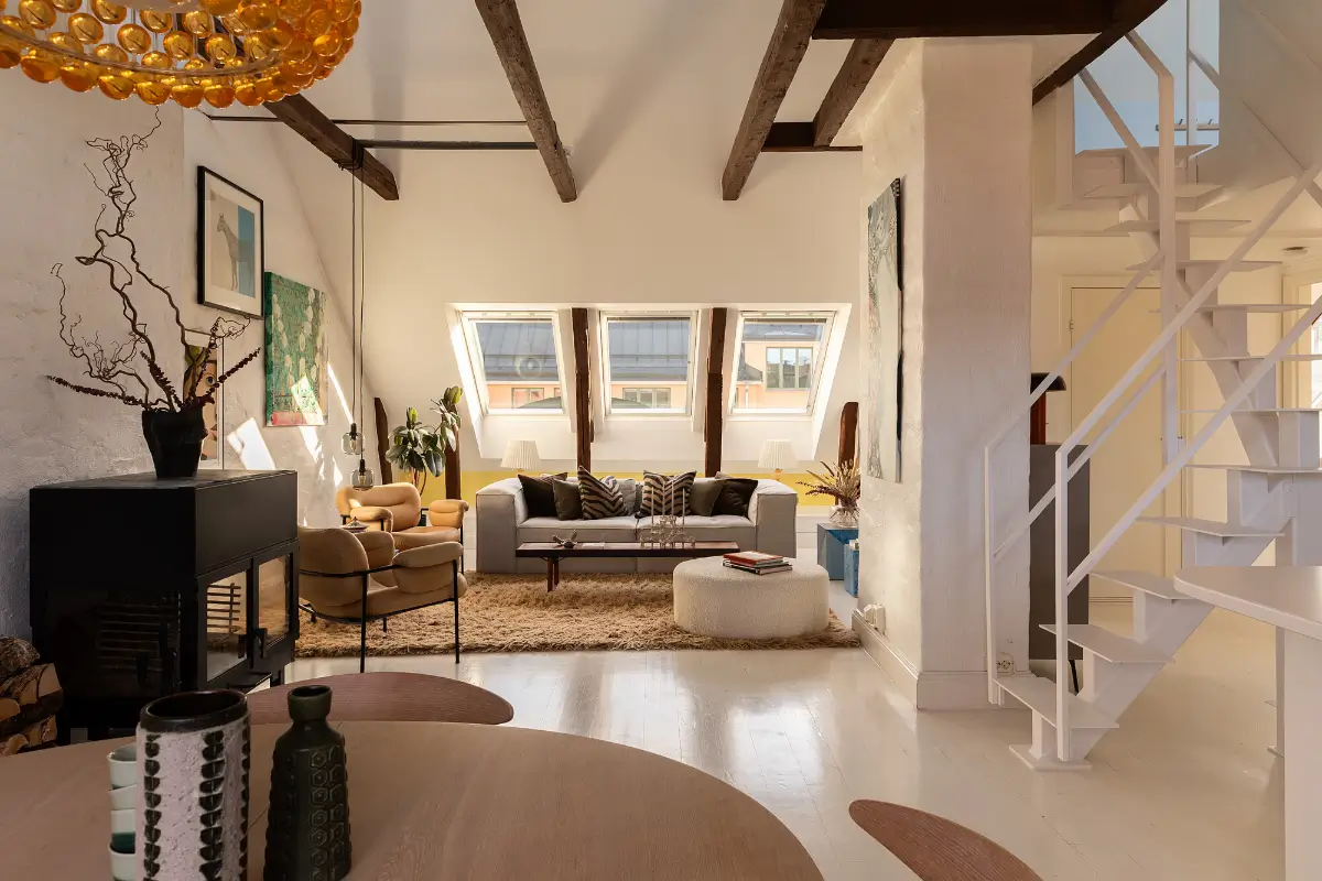 A Bright and Open-Plan Attic Apartment with Exposed Beams 1 bright-attic-apartment-stockholm-nordroom25