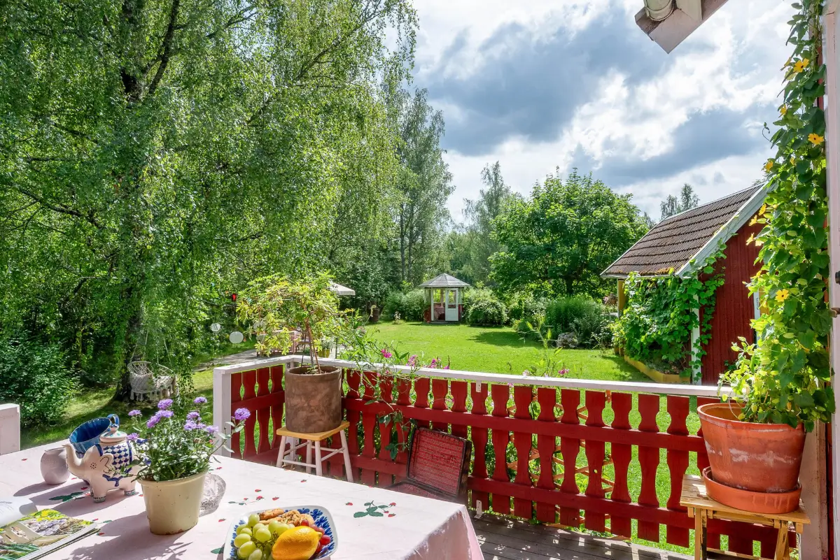 A Charming Swedish Cottage Decorated with Bold Colors and a Lush Garden 22 c