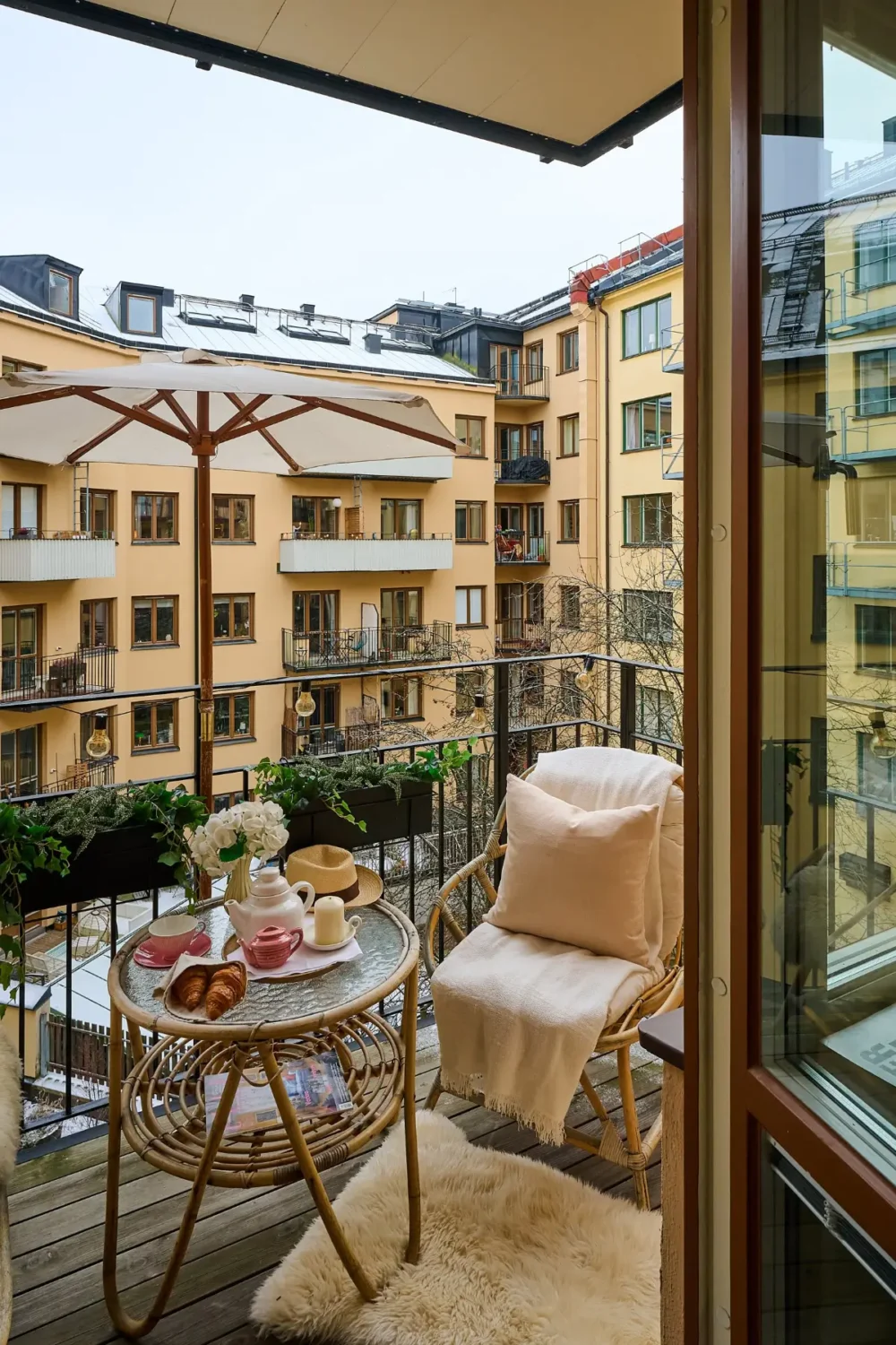 A Bright and Colorful 1930s Apartment in Stockholm 7 courtyard balcony