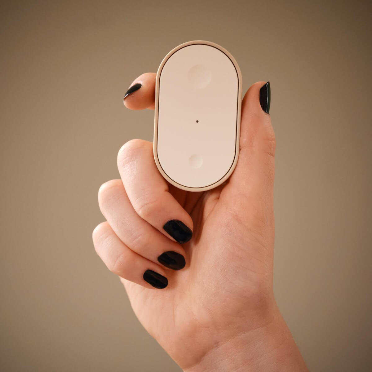IKEA Unveils 21 New Smart Home Products Compatible with Matter 10 en person haller i en fjaerrkontroll till en smarta hem prod 3f9c24bb1cb355d543f05c07143559de IKEA Unveils 21 New Smart Home Products Compatible with Matter
