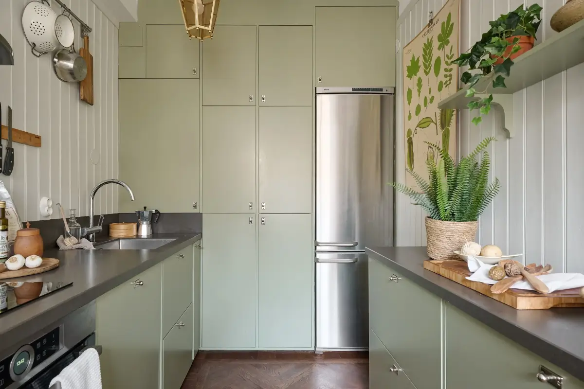 A Bright and Colorful 1930s Apartment in Stockholm 11 green kitchen cabinets