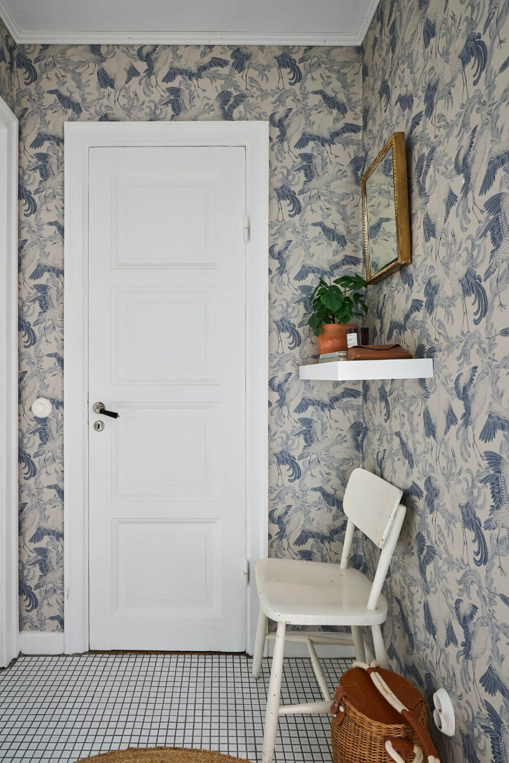 A Bright and Colorful 1930s Apartment in Stockholm 20 hall blue wallpaper A Bright and Colorful 1930s Apartment in Stockholm