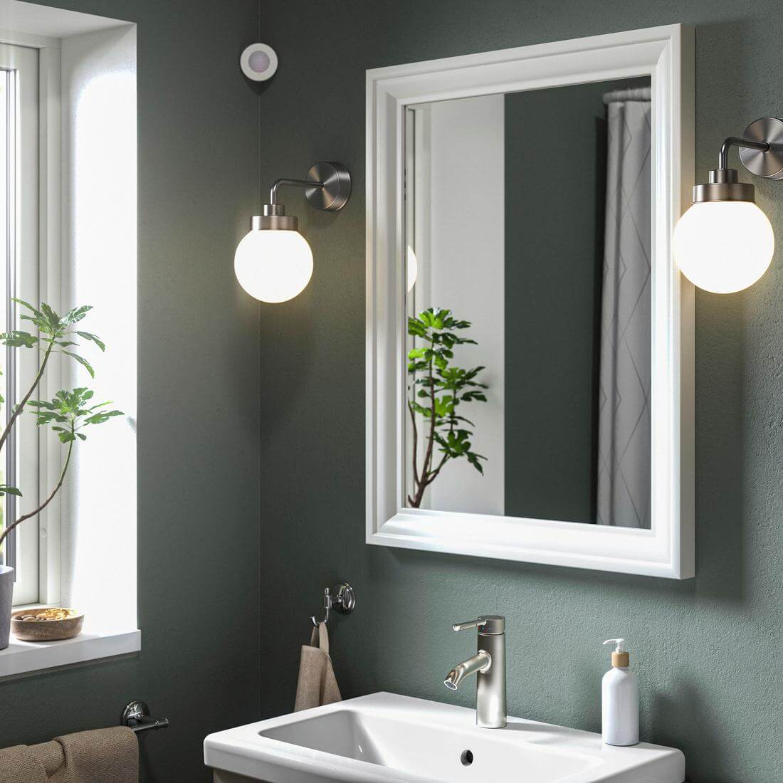 IKEA Unveils 21 New Smart Home Products Compatible with Matter 4 i-ett-badrum-haenger-en-spegel-tva-lampor-och-en-roerelsesen-f070638298290c56b3ec09fdce1173d3
