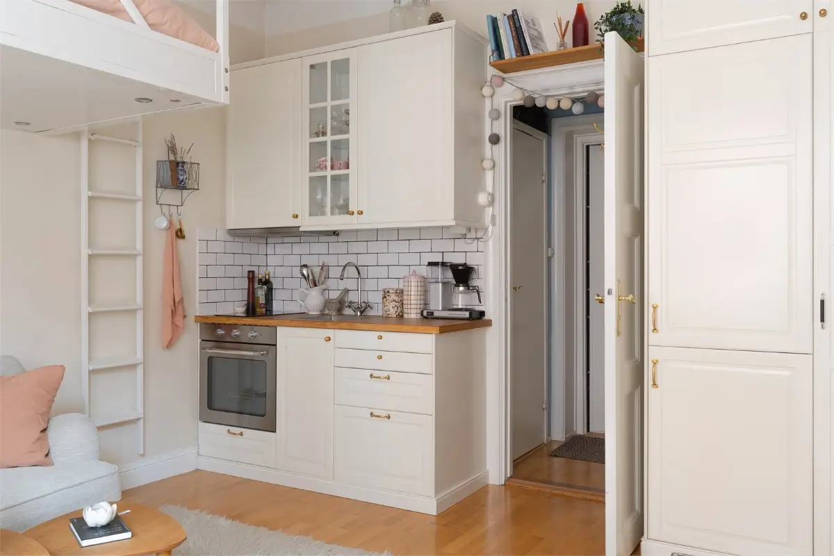 A Studio Apartment with a Large Bay Window and a Loft Bed 10 small-studio-apartment-bay-window-loft-bed-nordroom10