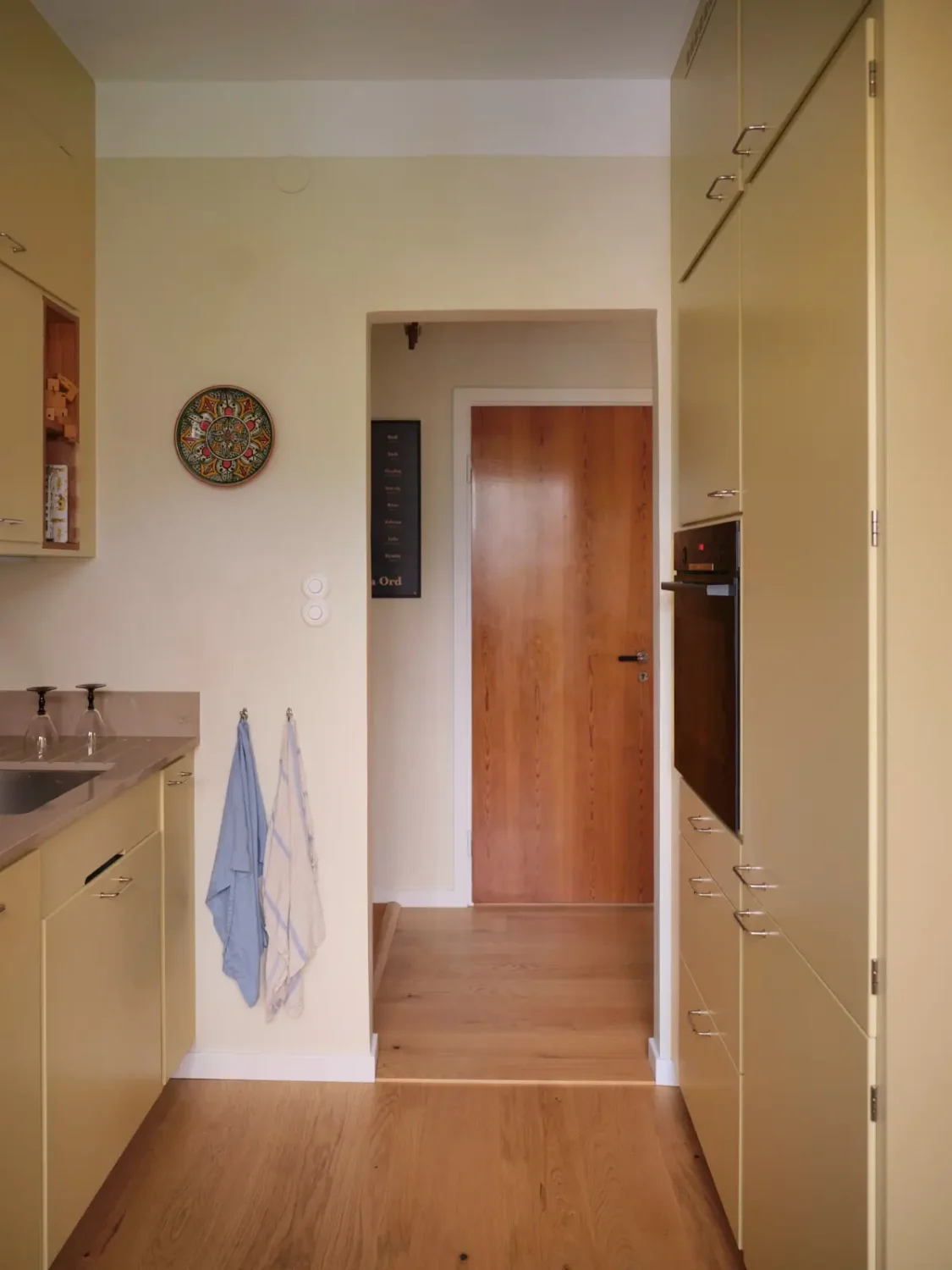 A Light Yellow Kitchen and Period Features in a 1940s Apartment 13 swedish-1940s-apartment-yellow-kitchen-nordroom12