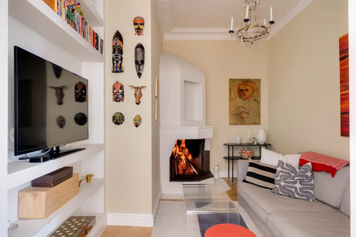 Classic Elements and Modern Comforts in an Elegant Apartment 5 tiny beige living room fireplace