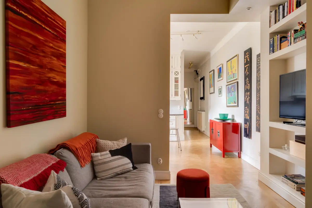 Classic Elements and Modern Comforts in an Elegant Apartment 4 tiny semi-open beige living room built-in shelves