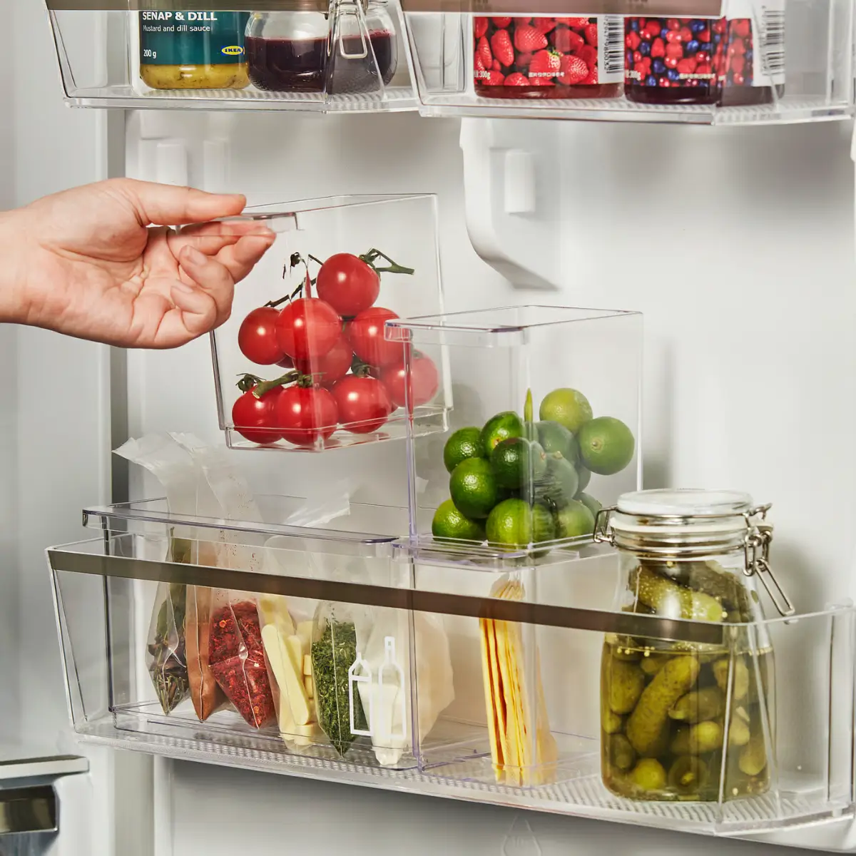 Small Space, Big Style: How to Design a Teeny-Tiny Kitchen That Works 21 klippkaktus ikea storage containers fridge nordroom Small Space, Big Style: How to Design a Teeny-Tiny Kitchen That Works