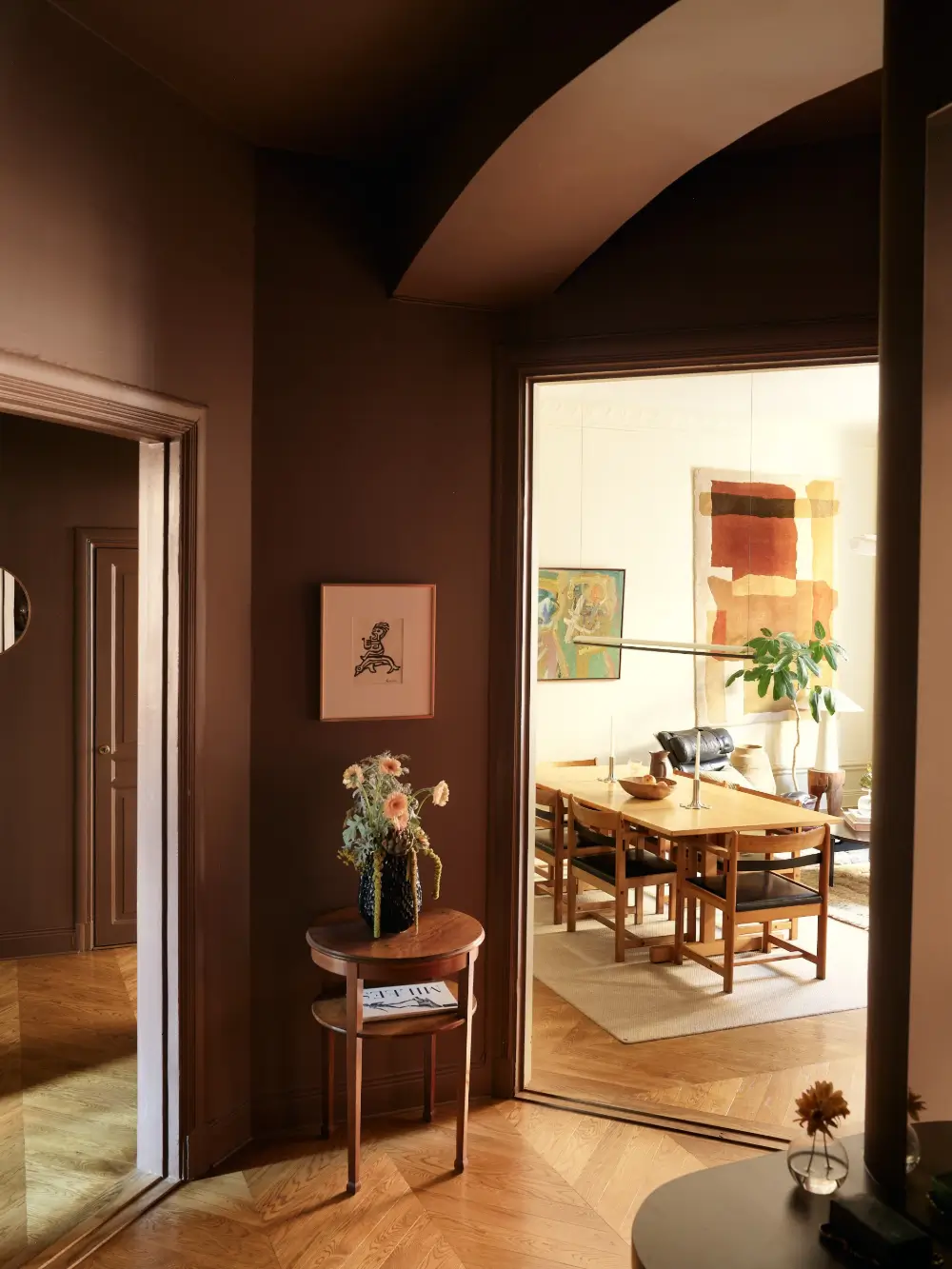 The 2027 Color of the Year Prediction: A Shift Toward More Expressive Colors? 7 red-brown-tones-renovated-turn-of-the-century-stockholm-apartment-nordroom