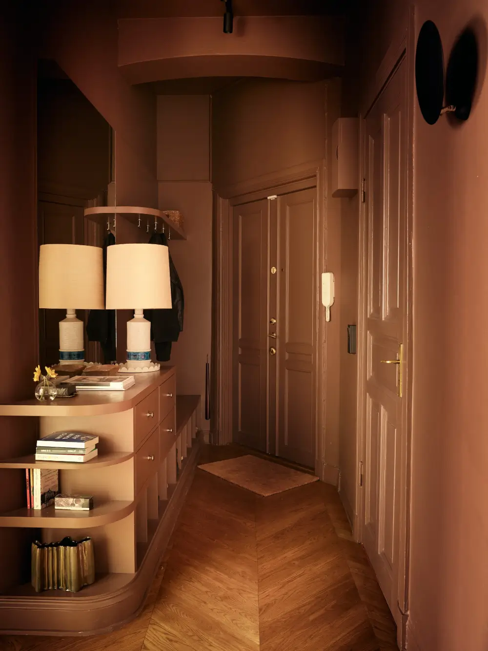 The 2027 Color of the Year Prediction: A Shift Toward More Expressive Colors? 8 red-brown-tones-renovated-turn-of-the-century-stockholm-apartment-nordroom