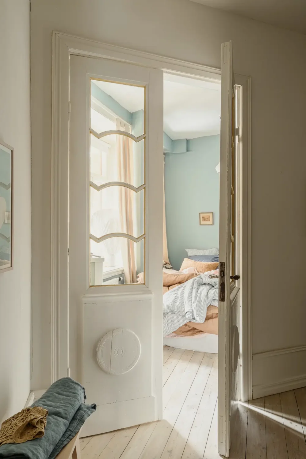 A Narrow Scandinavian Apartment with a Charming Blue Bedroom 6 turn-of-the-century-scandinavian-apartment-nordroom