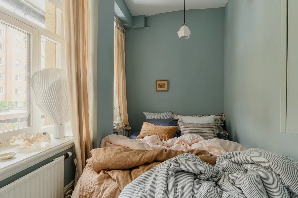 A Narrow Scandinavian Apartment with a Charming Blue Bedroom 11 turn-of-the-century-scandinavian-apartment-nordroom