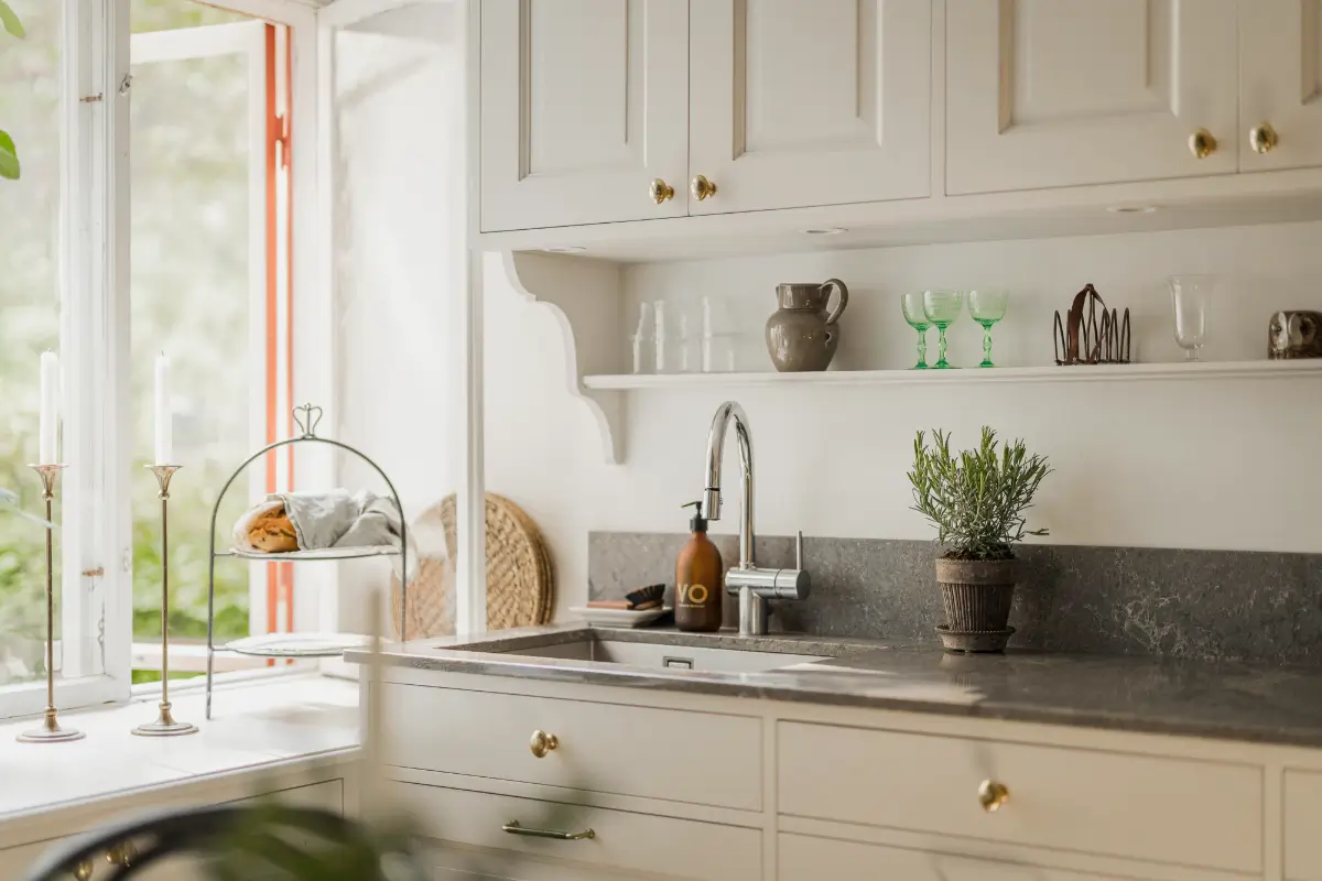 Large Windows, Period Character, and a Charming Kitchen in a Swedish Apartment 14 period-features-thoughtful-updates-scandinavian-apartment-nordroom