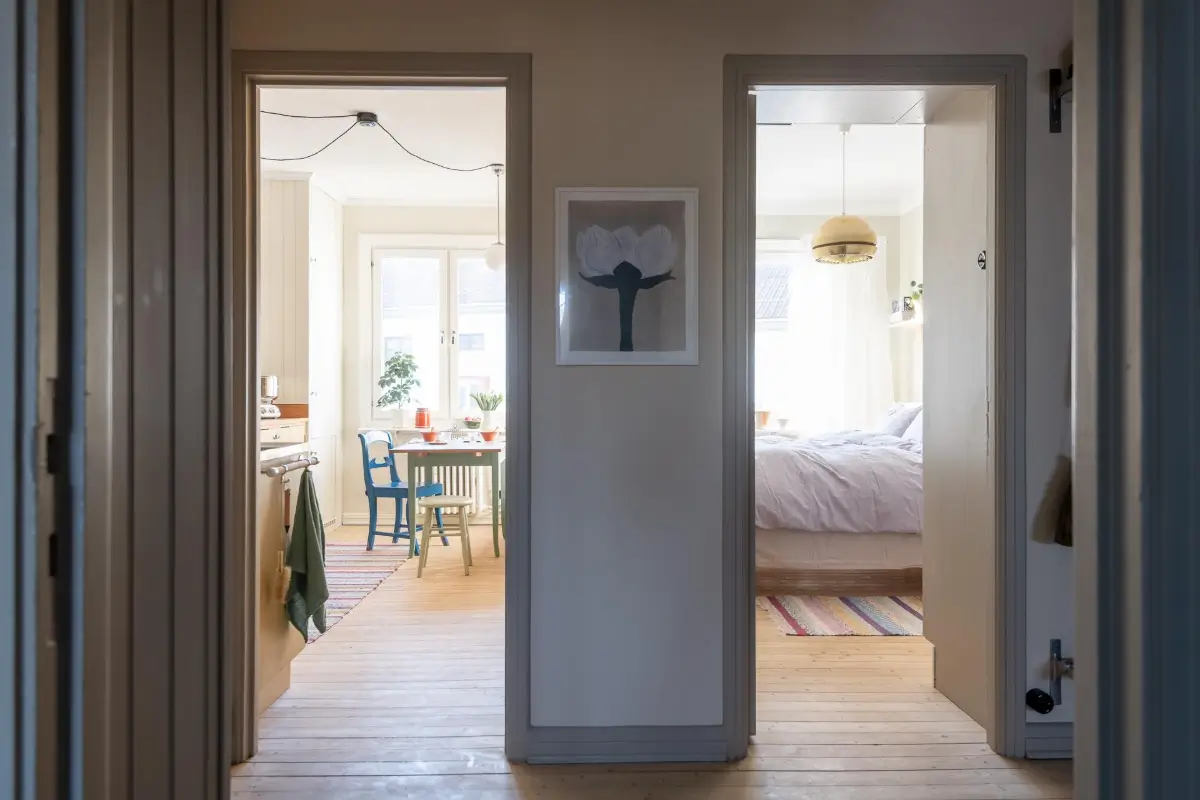 Preserved Details and a Warm Yellow Kitchen in a 1920s Apartment 20 yellow-kitchen-light-blue-living-room-ceiling-swedish-apartment