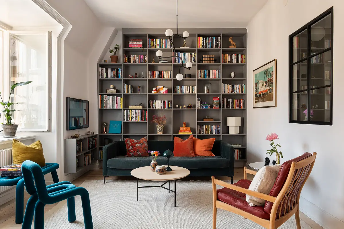 A Light Top-Floor Apartment with a Built-in Bookcase 1 floor-to-ceiling-bookcase-early-20th-century-apartment