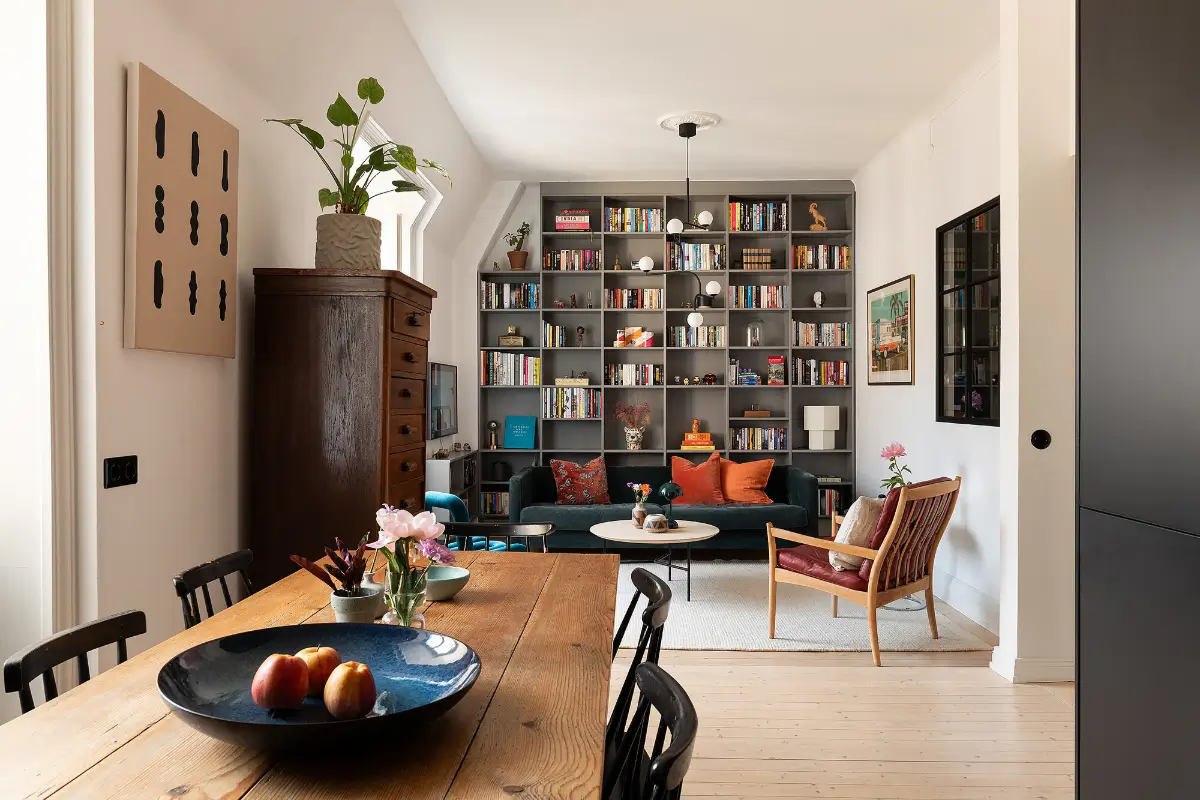 A Light Top-Floor Apartment with a Built-in Bookcase 8 floor-to-ceiling-bookcase-early-20th-century-apartment