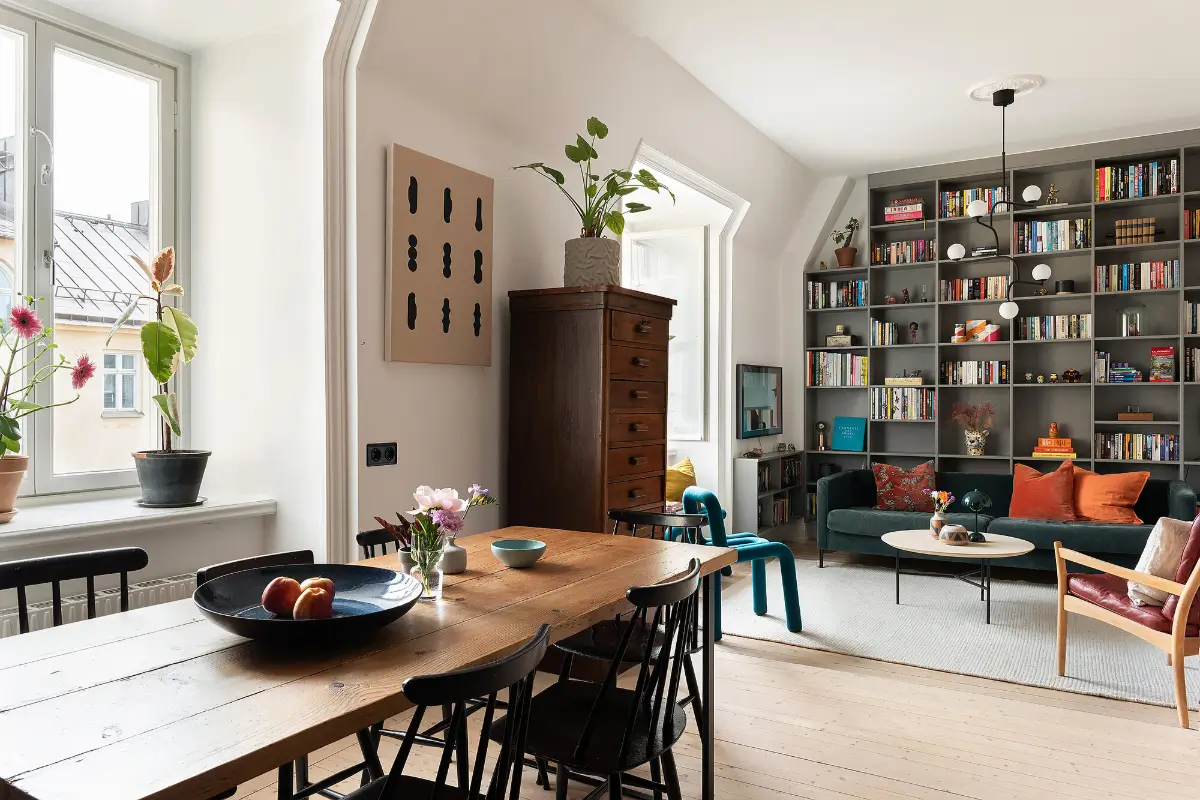 A Light Top-Floor Apartment with a Built-in Bookcase 3 floor-to-ceiling-bookcase-early-20th-century-apartment
