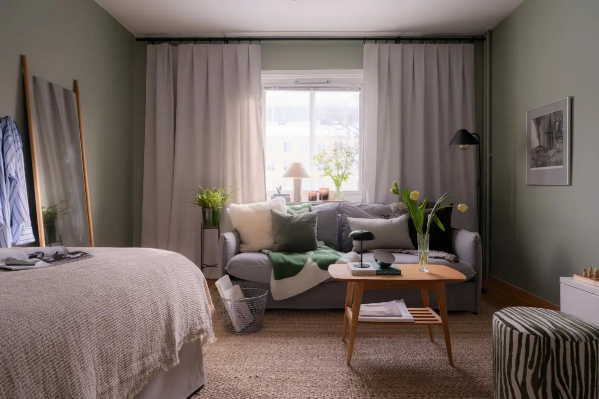 Studio Apartment Layout Ideas: Living Small is Looking Good 33 gray-green-studio-apartment-sofa-under-window-nordroom