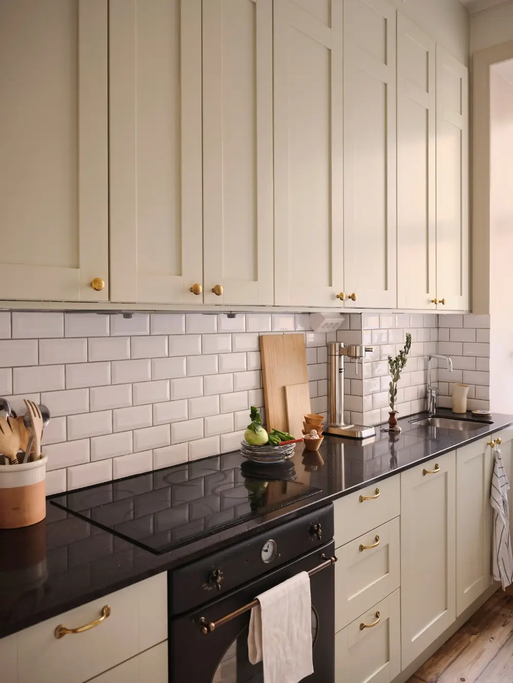 A Decorative Fireplace and Classic Touches in a 592 sq ft Stockholm Apartment 19 large-windows-period-features-renovated-early-20th-century-apartment-nordroom