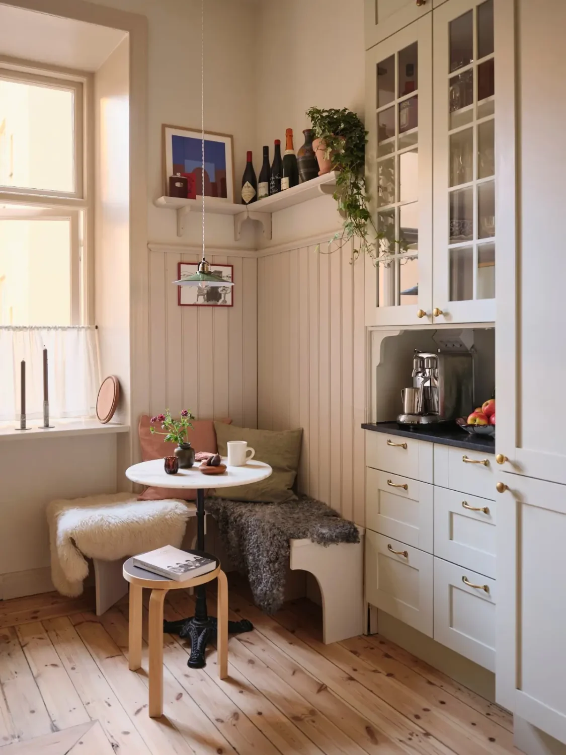 A Decorative Fireplace and Classic Touches in a 592 sq ft Stockholm Apartment 20 large-windows-period-features-renovated-early-20th-century-apartment-nordroom