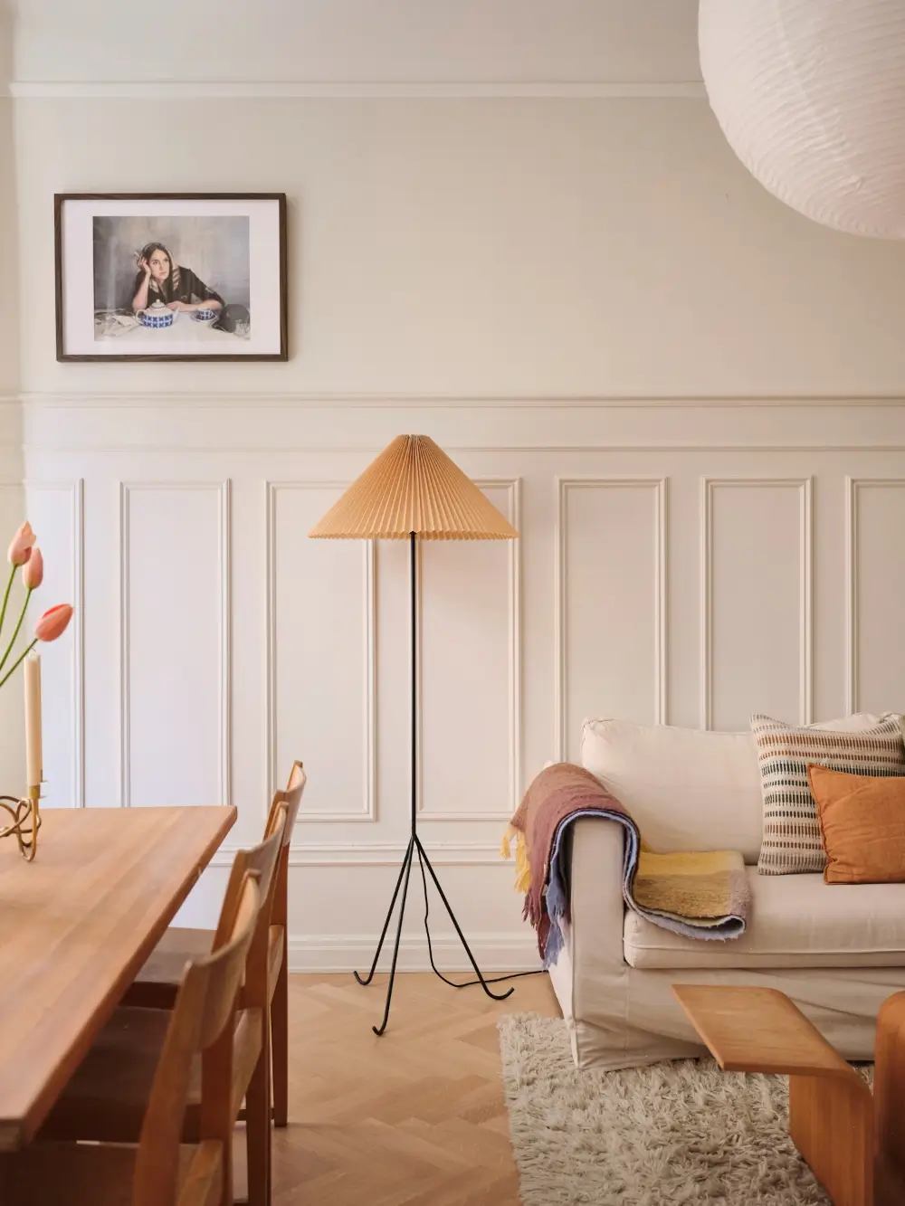 A Decorative Fireplace and Classic Touches in a 592 sq ft Stockholm Apartment 3 large-windows-period-features-renovated-early-20th-century-apartment-nordroom