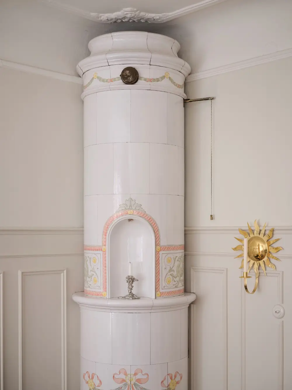 A Decorative Fireplace and Classic Touches in a 592 sq ft Stockholm Apartment 4 large-windows-period-features-renovated-early-20th-century-apartment-nordroom