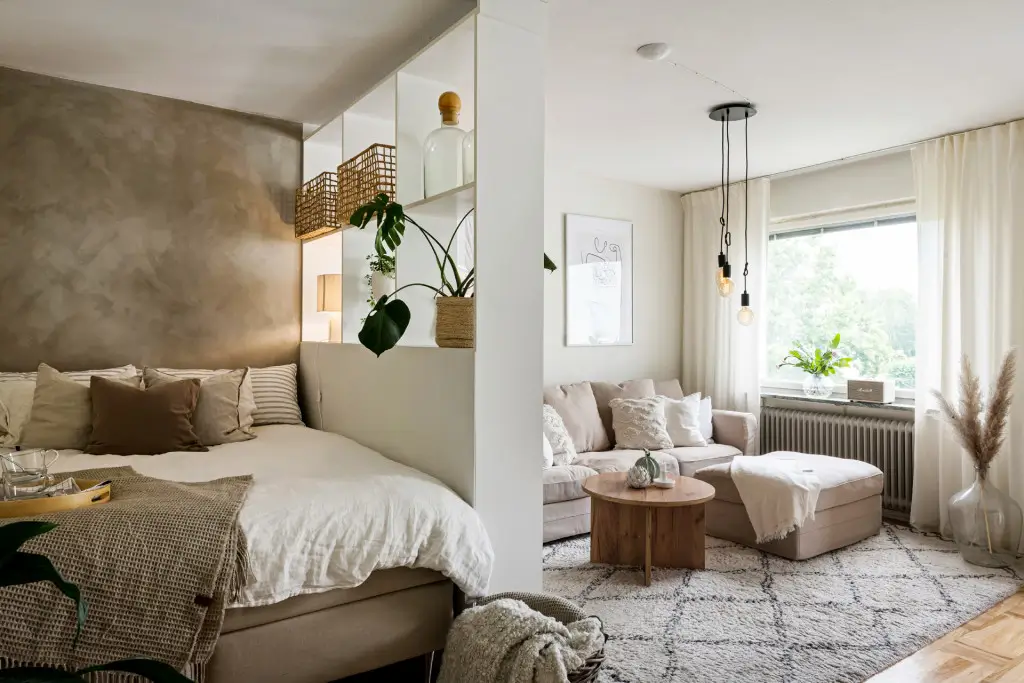 Studio Apartment Layout Ideas: Living Small is Looking Good 9 studio-apartment-partially-closed-bookcase-room-divider-nordroom