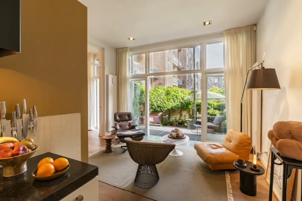 A Luxurious Amsterdam Duplex Apartment with Soaring Ceilings and a Private Garden 17 grand-amsterdam-duplex-apartment-small-garden