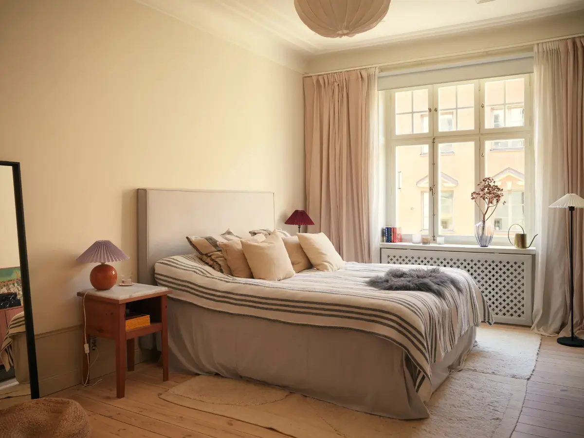 A Serene Color Palette and an Open-Plan Living Space in a Stockholm Apartment 21 open-plan-living-space-painted-ceiling-turn-of-the-century-stockholm-apartment-nordroom