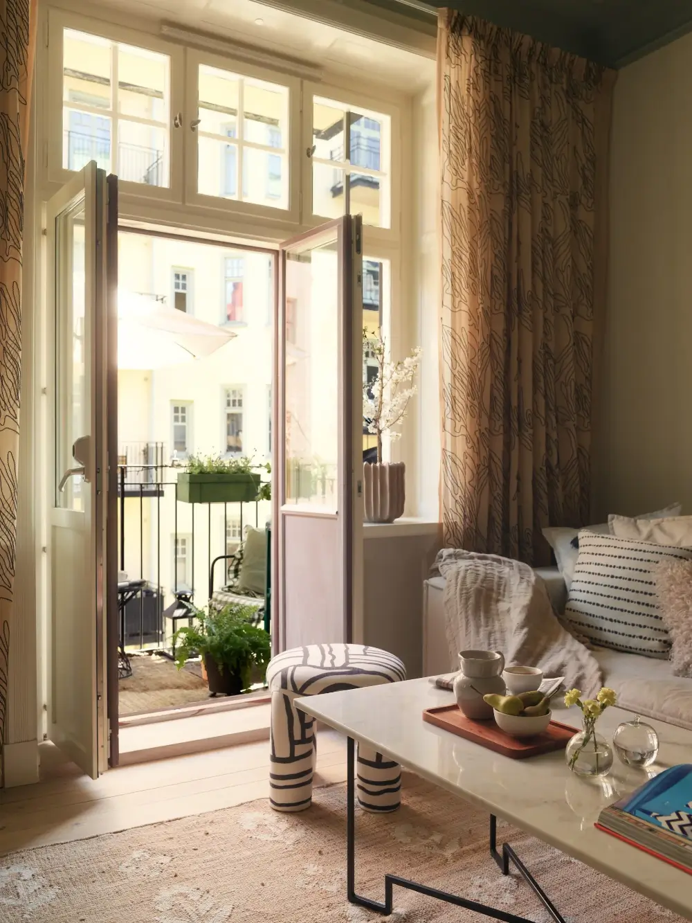 A Serene Color Palette and an Open-Plan Living Space in a Stockholm Apartment 3 open-plan-living-space-painted-ceiling-turn-of-the-century-stockholm-apartment-nordroom