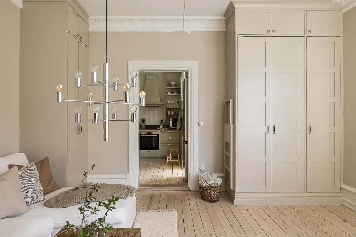 A Green Kitchen, Period Elements, and Jotun Colors in a Small Corner Apartment 6 renovated-late-19th-century-corner-apartment-gothenburg-nordroom